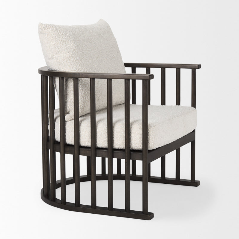 Modern armchair with black frame and white cushion on a white background