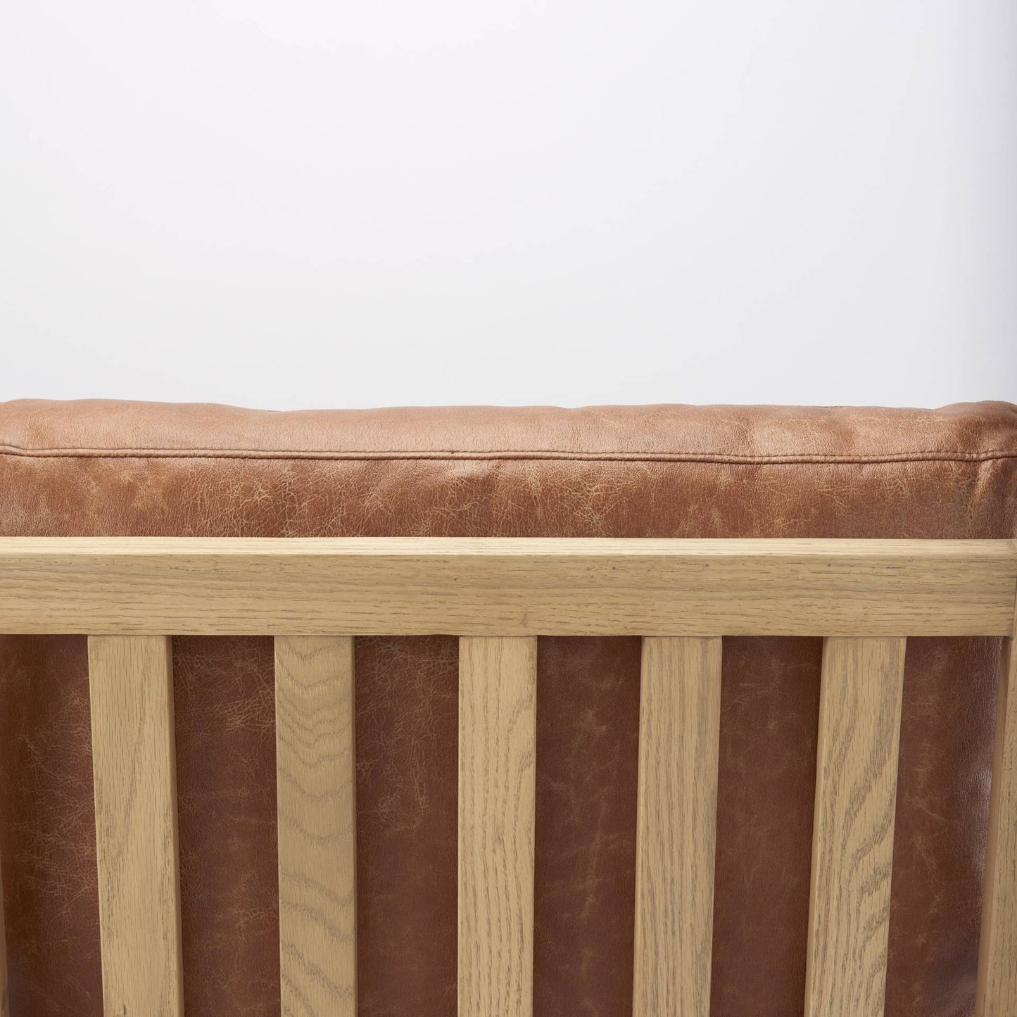 Raeleigh Faux Leather Accent Chair