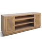 Wooden TV stand with wicker doors on a white background