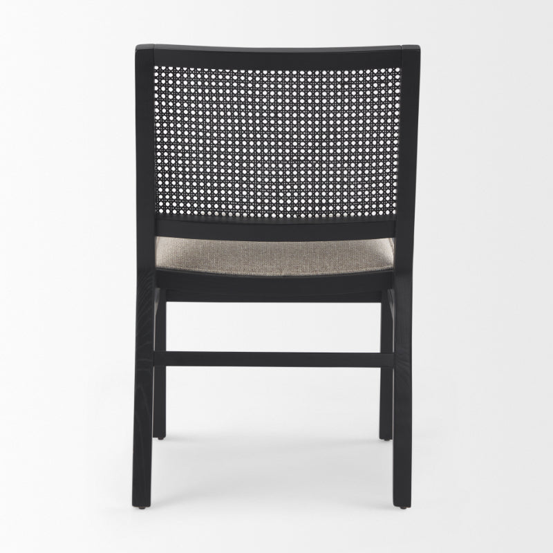 Black chair with woven backrest on a white background