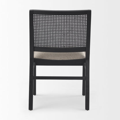 Black chair with woven backrest on a white background